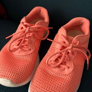 Orange mesh women’s Nikes